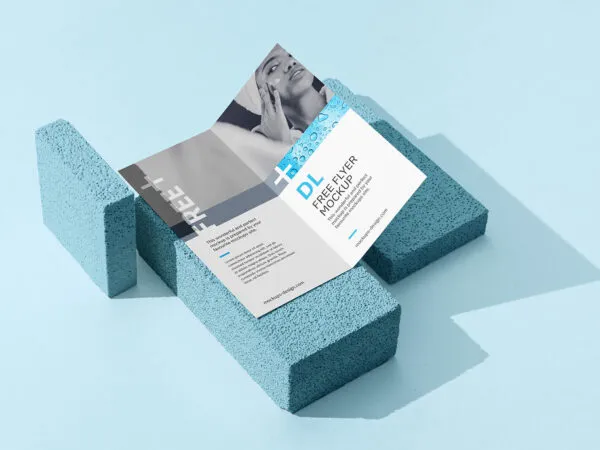 2 Open and Closed Bi fold DL Flyer on Stone Mockups 1