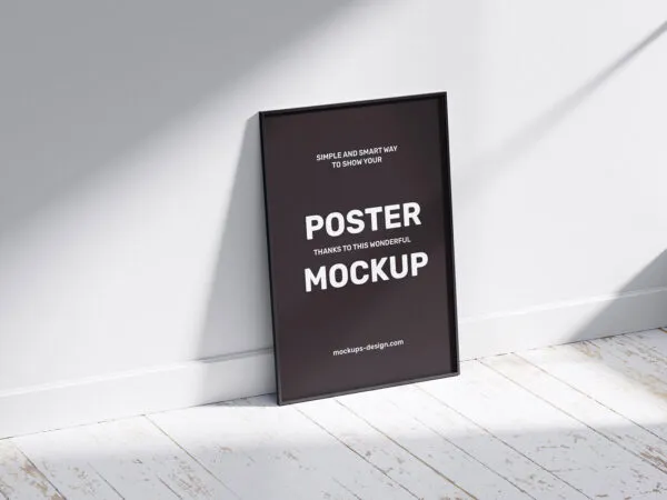 2 Poster Frame Mockups Laid on the Wall 1