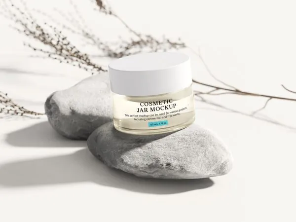 3 Cosmetic Jar Mockups Located on Stones 1