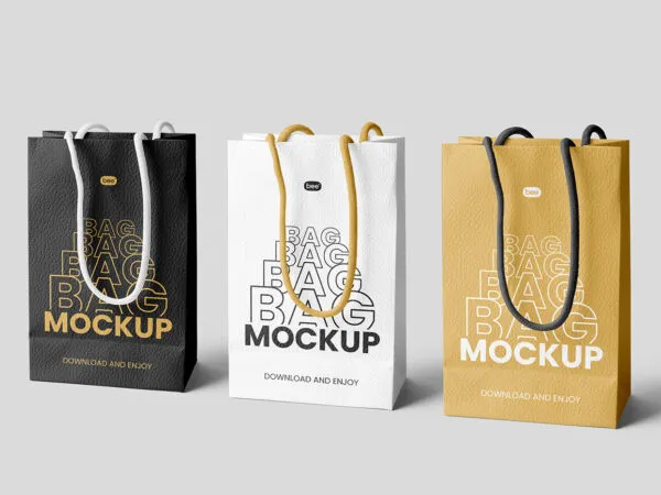 3 Eco Leather Gift Bags Mockup Standing Next to Each Other 1