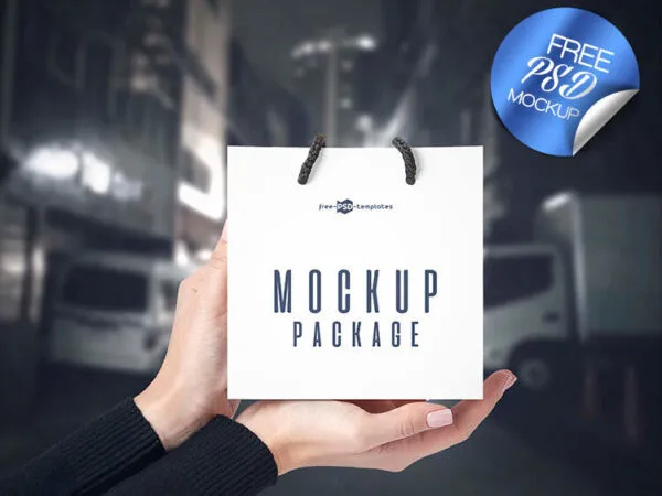 3 Front View Mockups of a Square Paper Bag in Hand 1