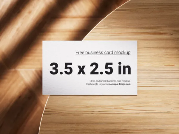 3 Mockups of Business Cards Lying On Wooden Table 1