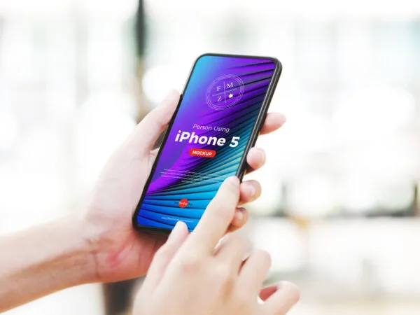 34 View Person Using iPhone 5 Mockup 1