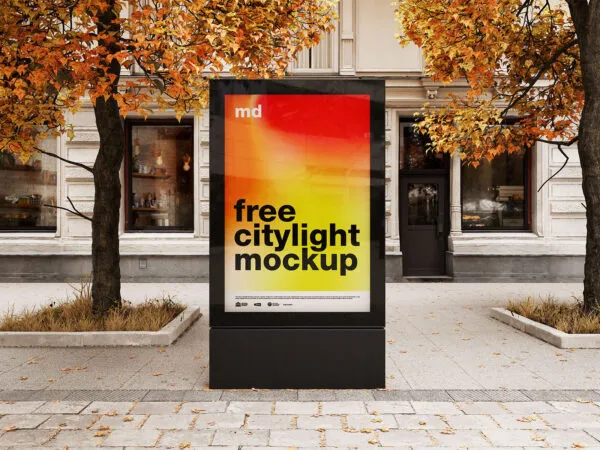 4 Black Vertical Citylight Mockups Next to Autumn Trees 1