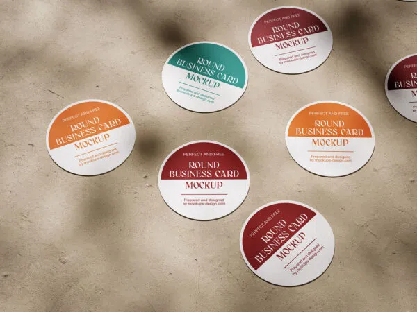 5 Mockups of Circle Business Cards on Concrete Floor 1