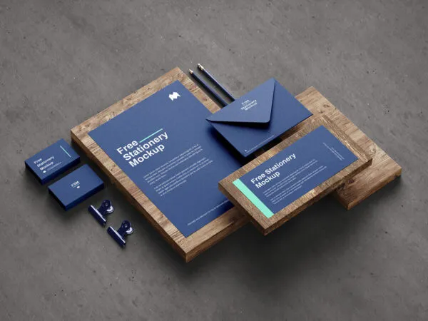 5 Mockups of Stationery in Different Views Featuring Wooden Boards 1