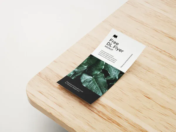 6 Mockups of DL Flyer on Wooden Table in Different Views and Positions 1