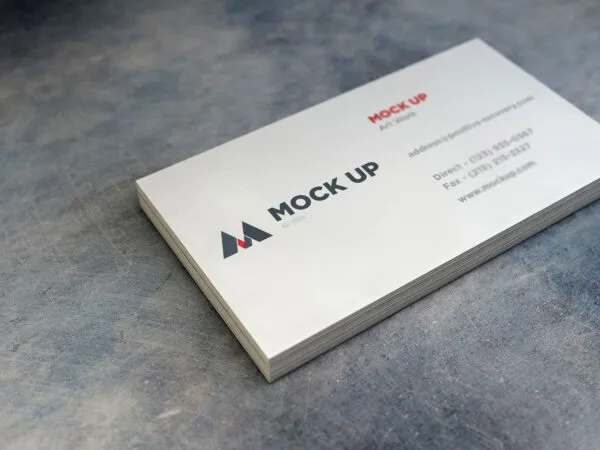 A Sack of Realistic Business Cards on a Stone Texture Mockup 1