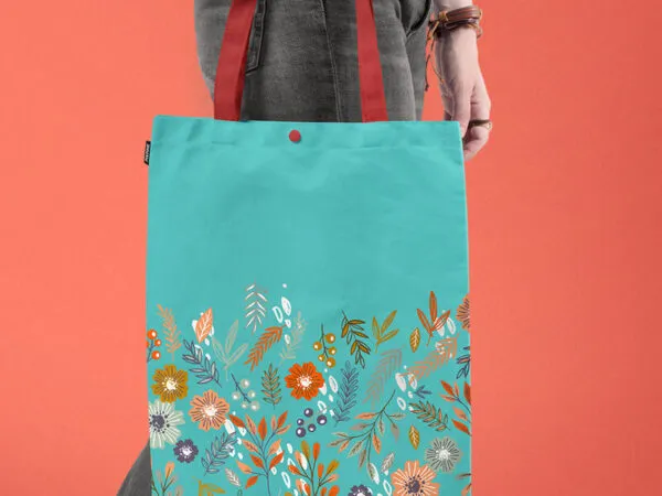 A Tote Bag in a Persons Hand Mockup 1
