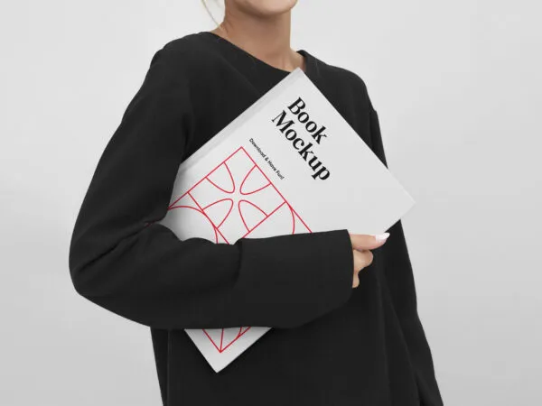 A Woman Holding a Book Mockup 1
