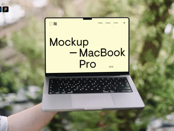 Arm Holding MacBook Pro Mockup in Garden 1