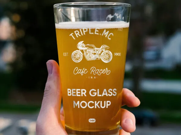 Beer Glass in Hand Mockup 1