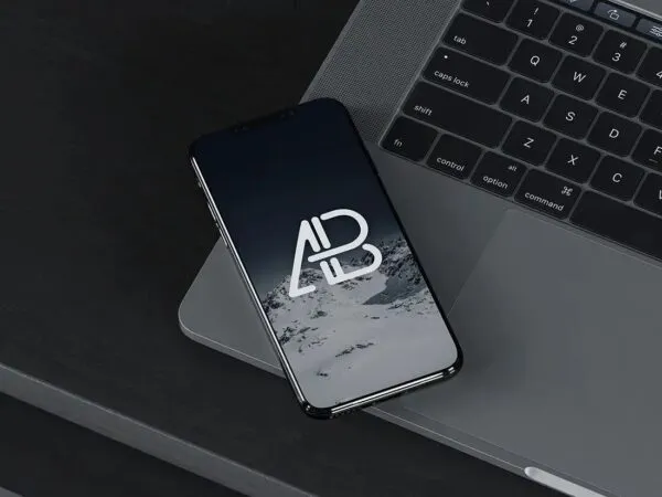 Black iPhone X on MacBook Pro Mockup 1