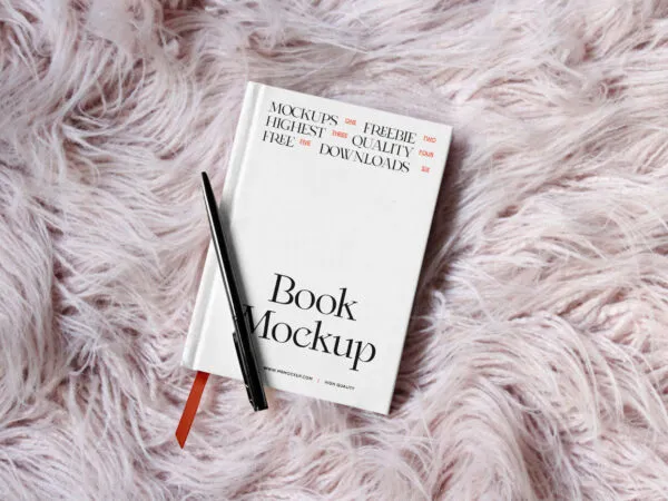 Book Mockup with Pen in Top View 1