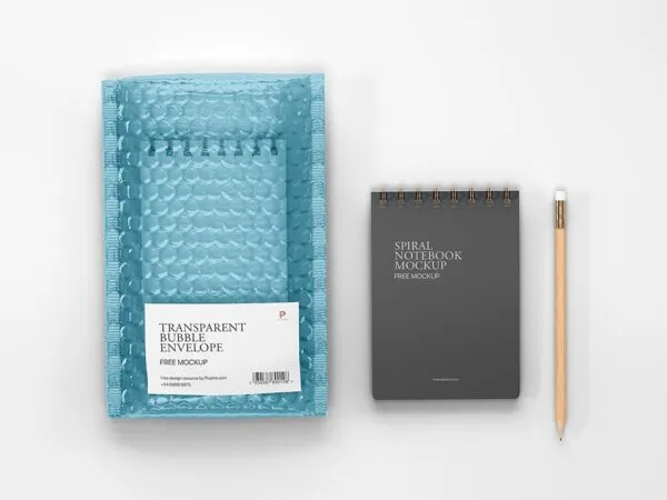 Branding Mockup Featuring Bubble Mailer Envelope and Notebook in Top View 1