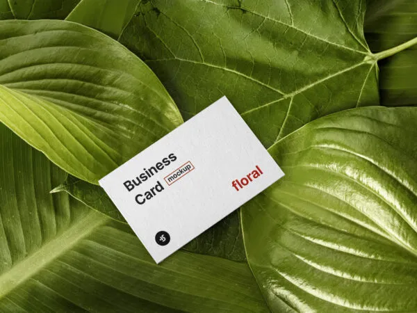 Business Card Placed on Green Leaves Mockup 1