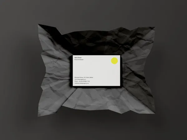 Business Card Wrapped in Wrinkled Paper Mockup 1