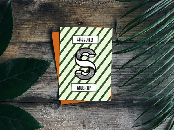 Card Mockup with Plant and Wooden Background 1