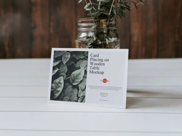 Card Placing on Wooden Table Leaning to a Jar Mockup 1