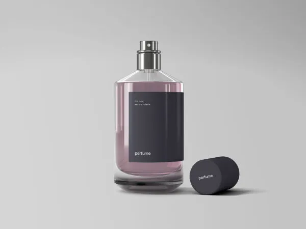 Classic Glassy Perfume Bottle with a Cap Next to it Mockup 1 1