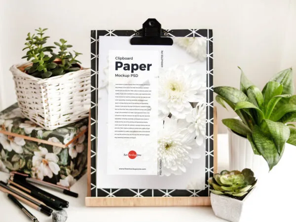 Clipboard with Paper in Wooden Stand Mockup Featuring Plant Pots 1