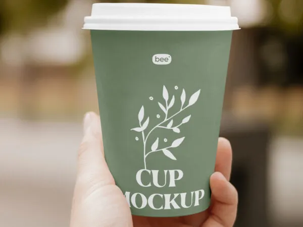 Close up Showcase of Paper Cup Mockup in Hand 1