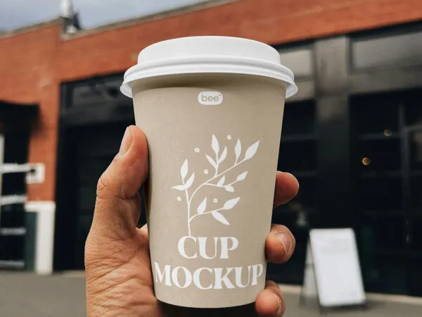 Close up Sight of Big Paper Cup Mockup in Hand 1