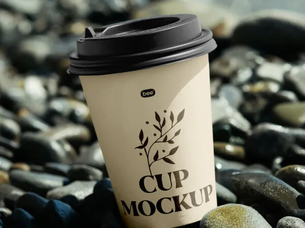 Close up Sight of Paper Cup Mockup on Stone Beach 1