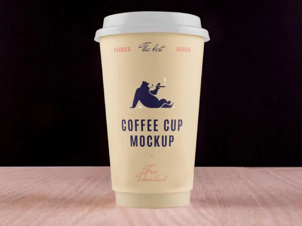 Coffee Cup Placed on Table in Front View Mockup 1