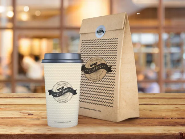 Coffee Cup and Paper Bag on Wooden Texture Mockup 1