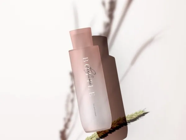 Cosmetic Bottle Mockup with Wheat and Shadow Overlay in Top View 1