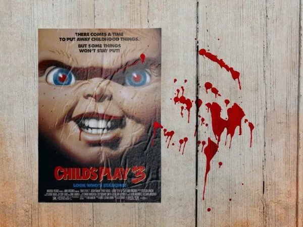 Crumpled Horror Movie Poster Mockup on the Wall 1