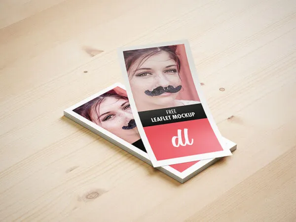 DL Leaflet Brochure on Wooden Surface Mockup 1