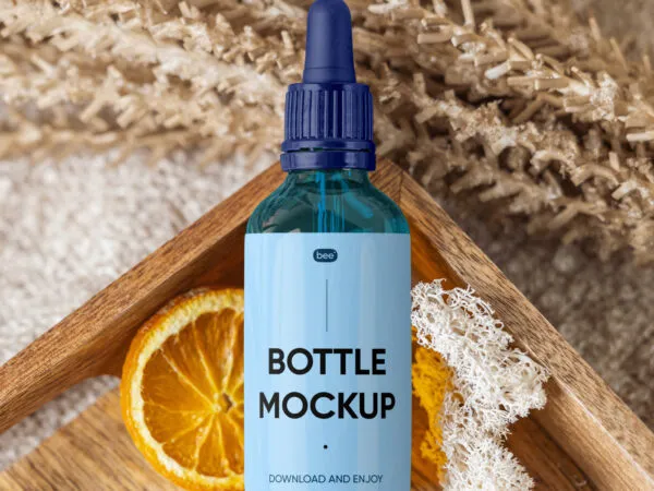 Dropper Bottle Mockup Placed on Wooden Tray in Top View 1