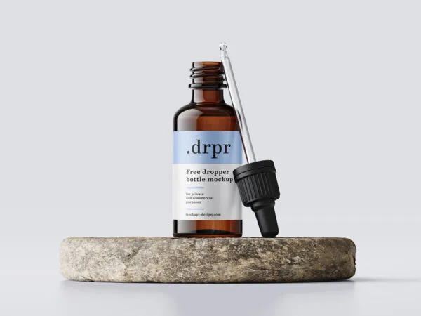 Dropper Bottle and Dropper on a Rock Mockup 1