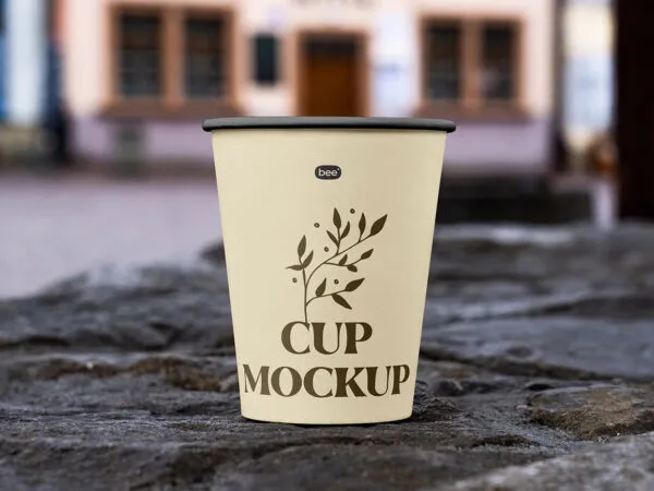 Facing View of Open Paper Cup Mockup on Wall 1