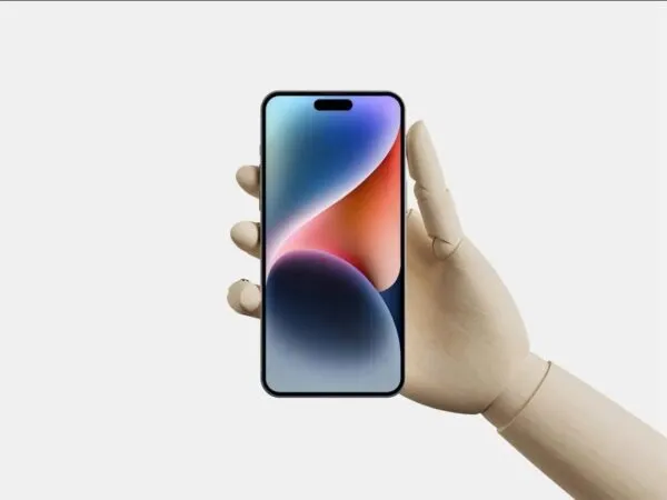 Facing View of Wooden Hand Holding iPhone 14 Pro Max Mockup 1