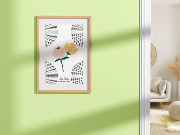 Facing View of Wooden Photo Frame Mockup on Wall 1