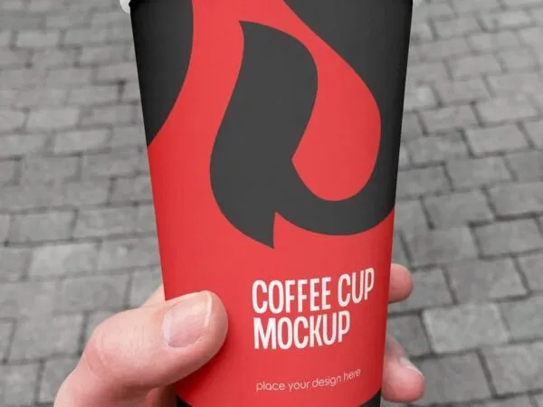 Facing Vision of Coffee Cup Mockup in Hand 1