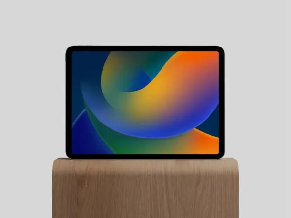 Facing Vision of M2 iPad Pro Mockup on Wood Stand 1