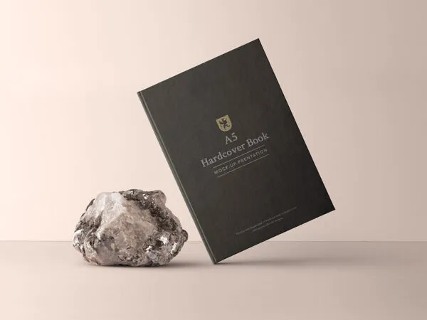 Floating Hardcover Book Beside a Gemstone Mockup 1