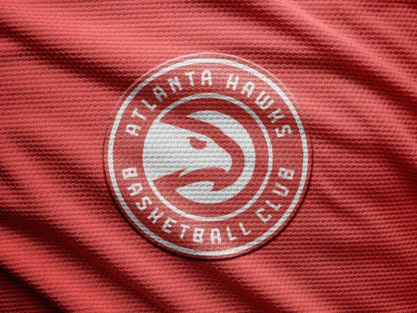 Four Mockups Showcasing Top View of Logo on Wrinkled Fabric 1