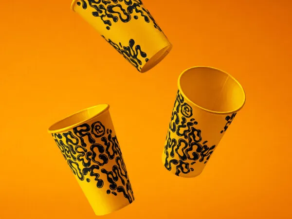 Front Shot of Falling Paper Cups Mockup 1