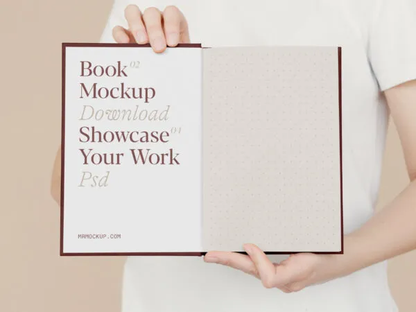 Front Sight of Open Book Mockup Holding by Man 1