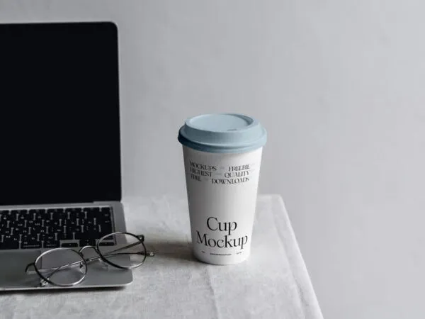 Front Sight of Paper Coffee Cup Mockup with MacBook 1