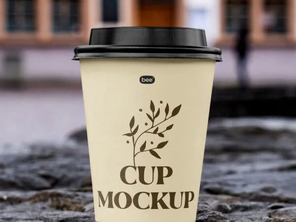 Front Sight of Paper Cup Mockup on Stone Wall 1