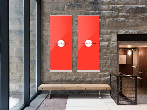 Front View 2 Indoor Vertical Banners on Stone Wall Mockup 1