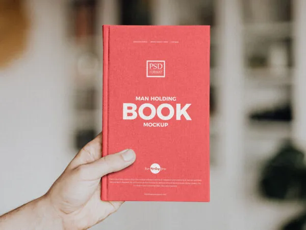 Front View Book in Hand Mockup 1