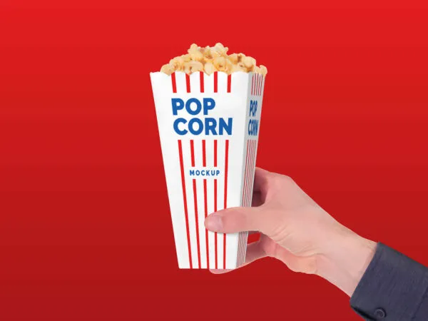Front View Hand Holding Movie Theater Popcorn Paper Box Mockup 1