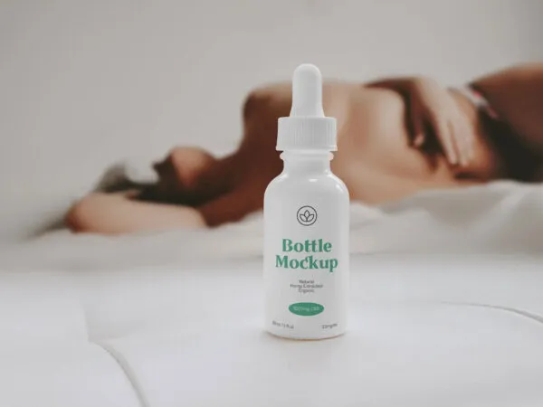 Front View of Bottle Dropper Mockup with Woman 1